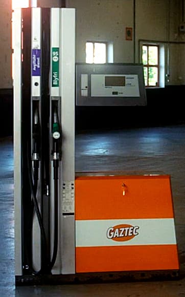 Petrol pump with Gaztec branding in an indoor setting.